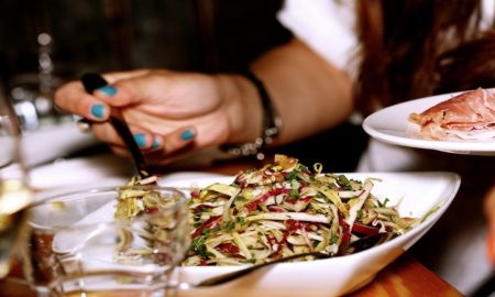woman eating vegetables